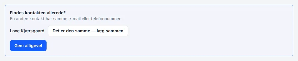 The warning: another contact has the same email or phone number